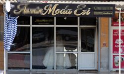 Boşanmak isteyen eşinin gelinlikçi dükkanını benzin dökerek ateşe verdi