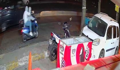 Motosikletli saldırganlar marketi kurşunladı