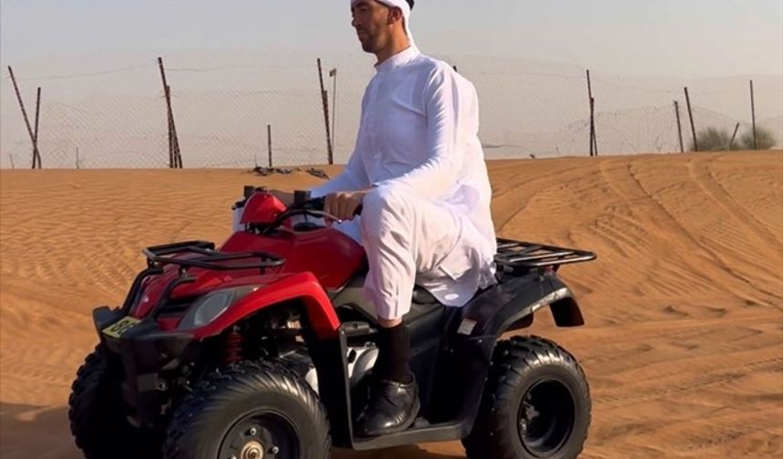 "Dünyanın en uzun adamı" Sultan, Dubai'de ATV ile çöl safarisi yaptı