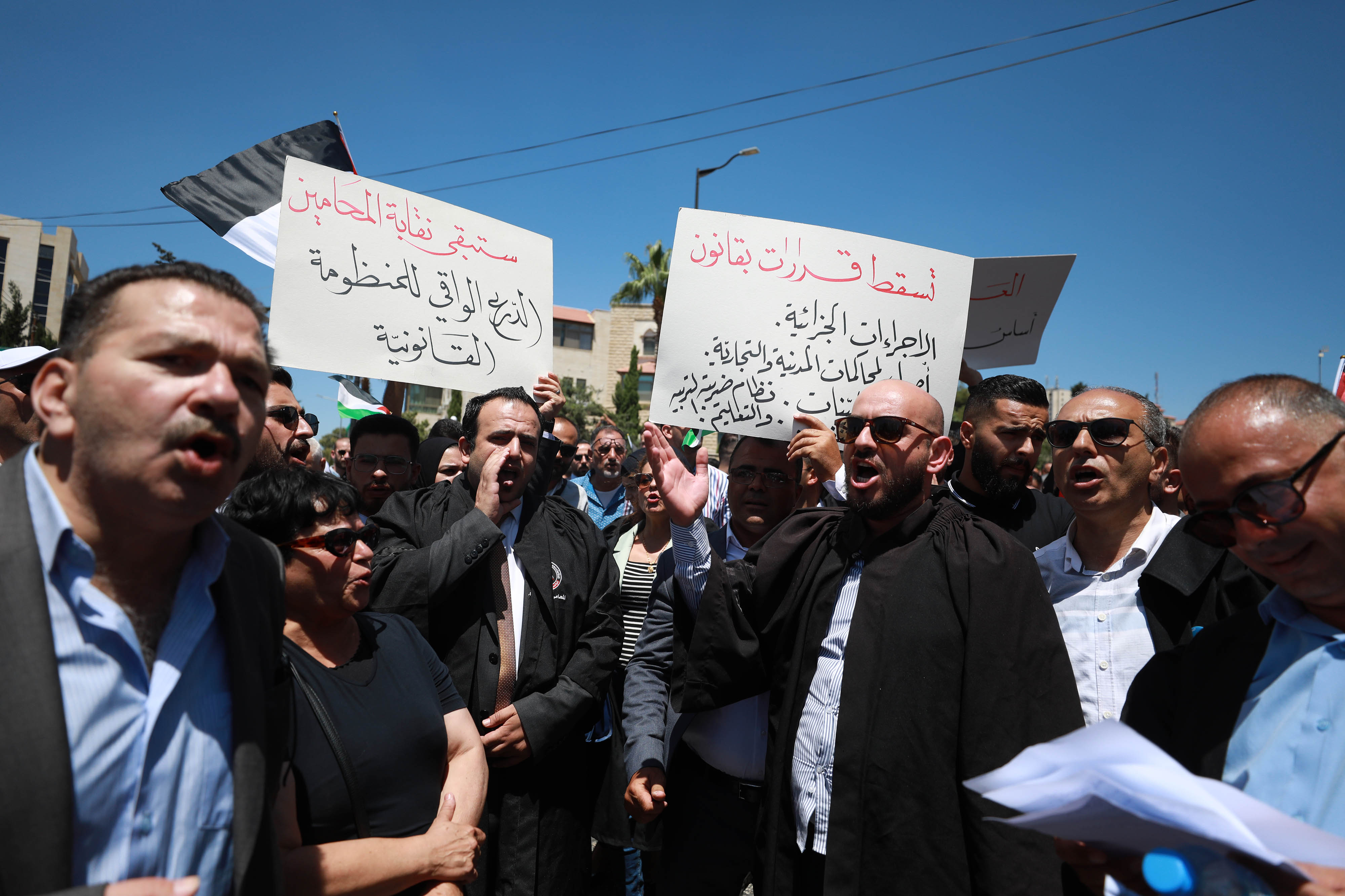 AA-20220725-28497673-28497658-FILISTINLI_AVUKATLAR_DEVLET_BASKANI_ABBASIN_CIKARDIGI_KHKLERI_PROTESTO_ETTI