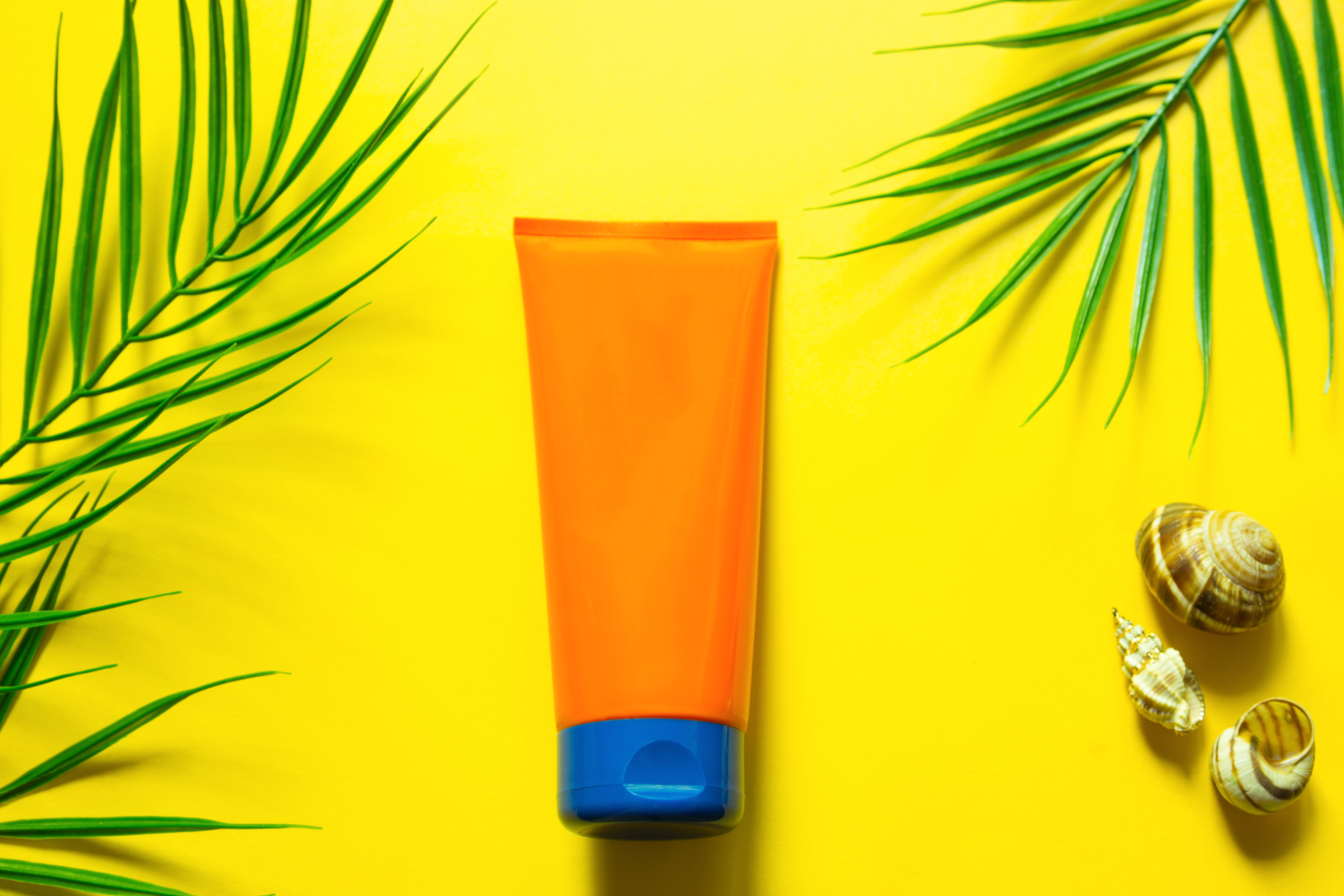 Tube Of Sunscreen On A Yellow Summer Background Wi 2023 11 27 05 34 05 Utc