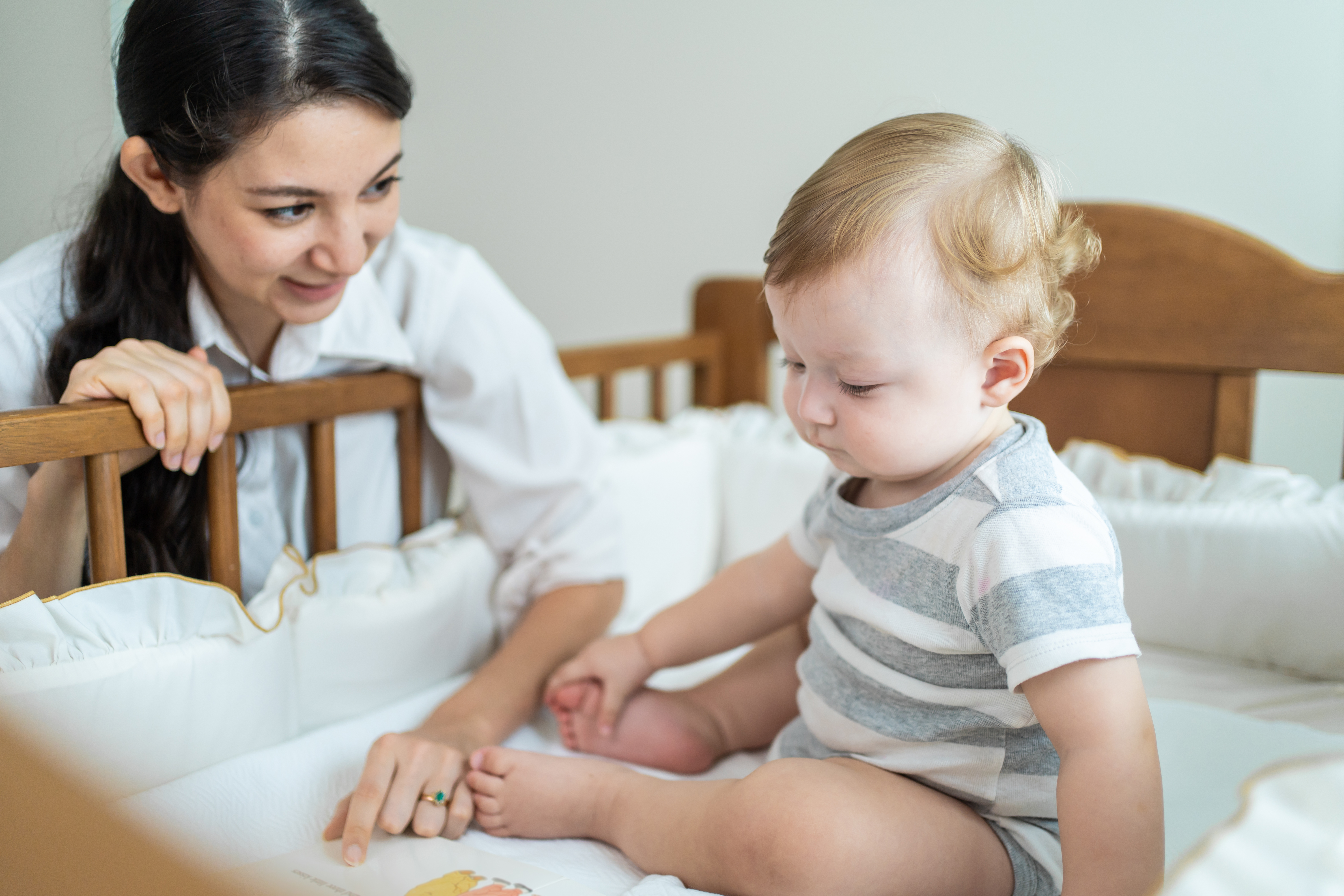 Caucasian Mom Read Storytale To Baby Infant In Chi 2023 11 27 05 31 32 Utc