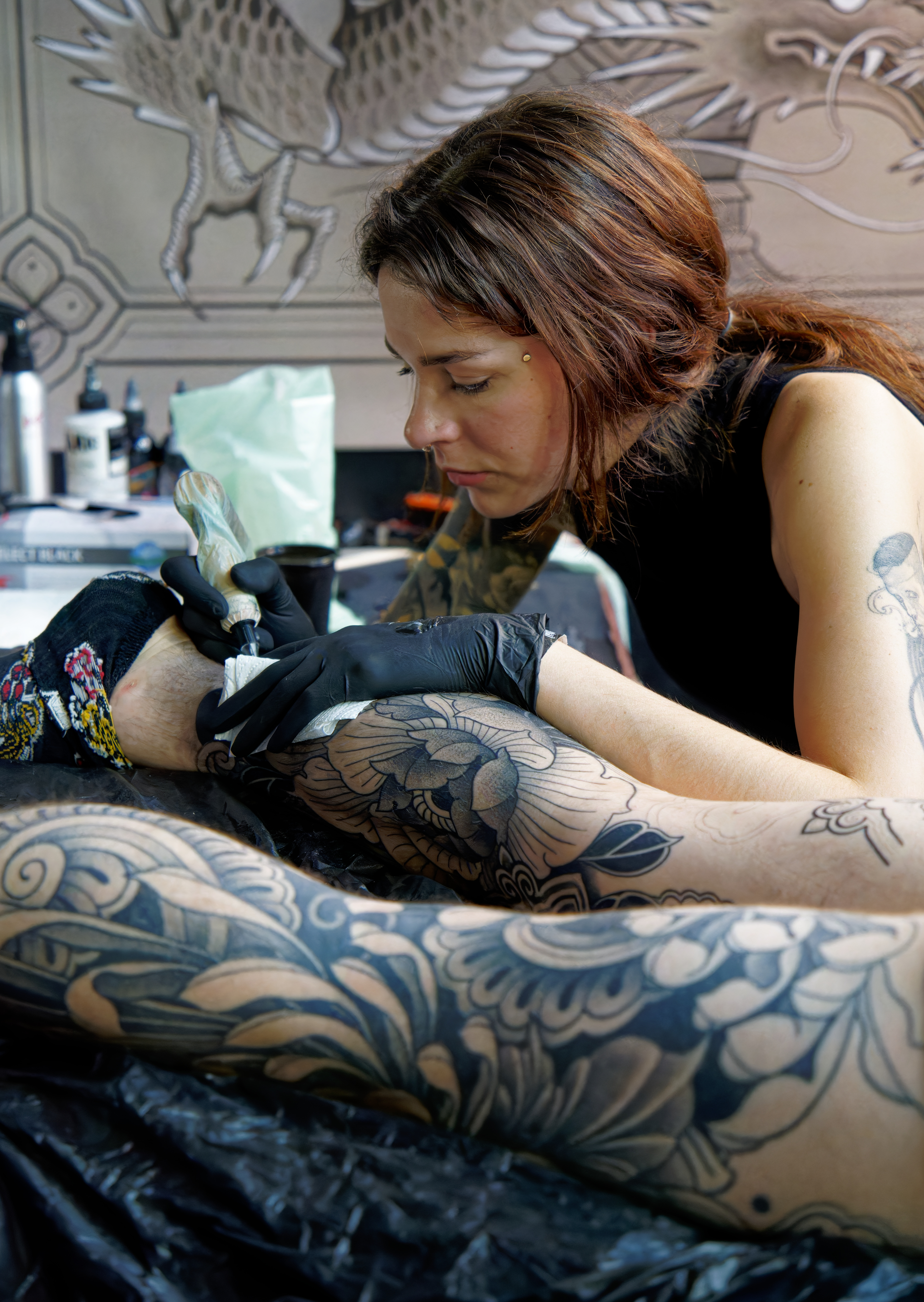 Female Tattoo Artist At Work