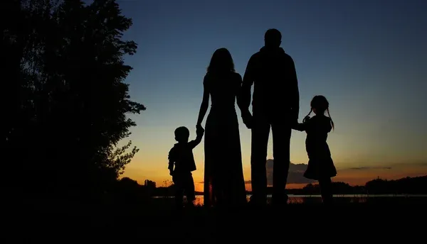 Depositphotos 115060850 Stock Photo Silhouette Of Family With Children